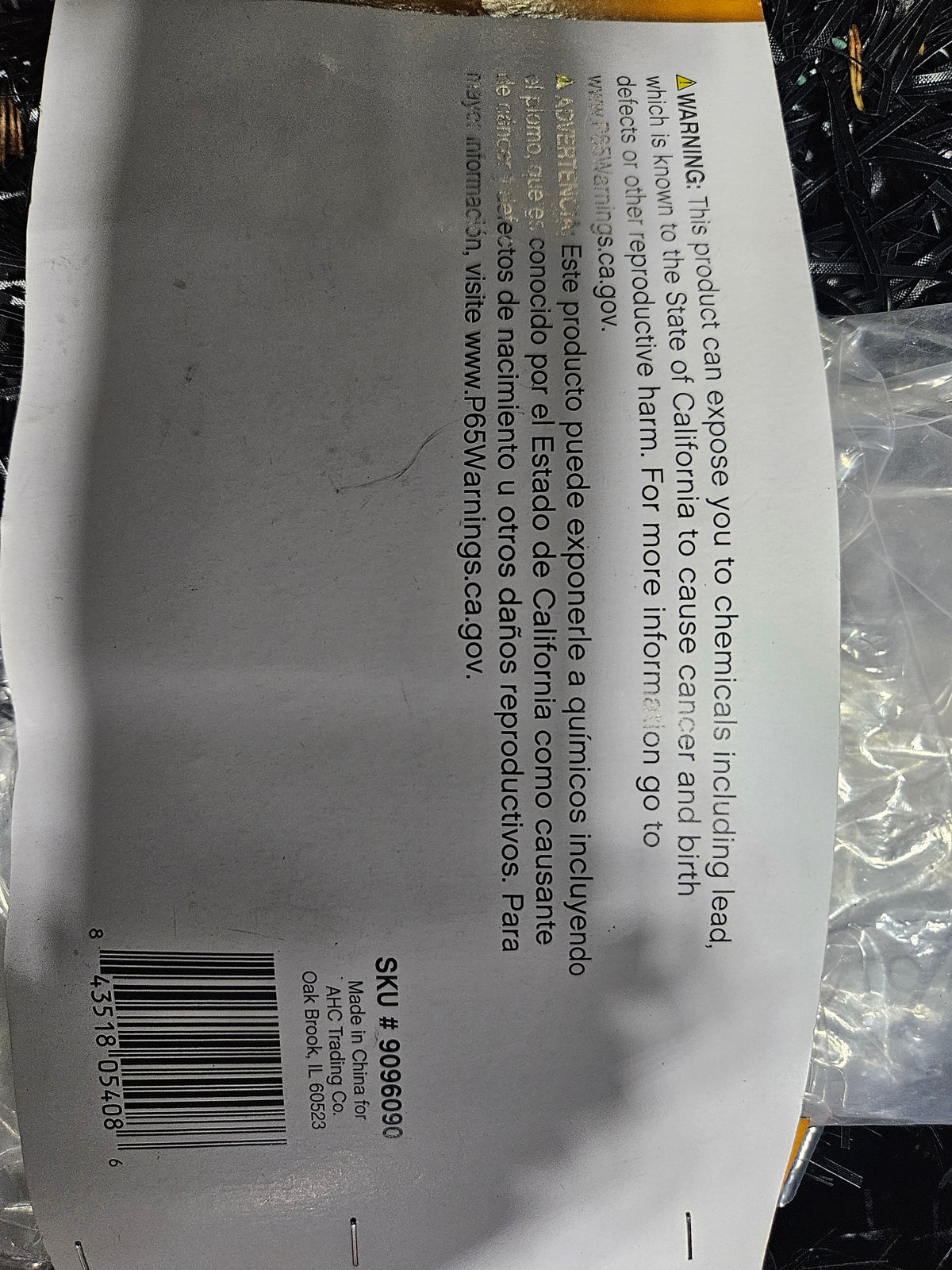Back label showing UPC 843518054086 and California Proposition 65 lead warning