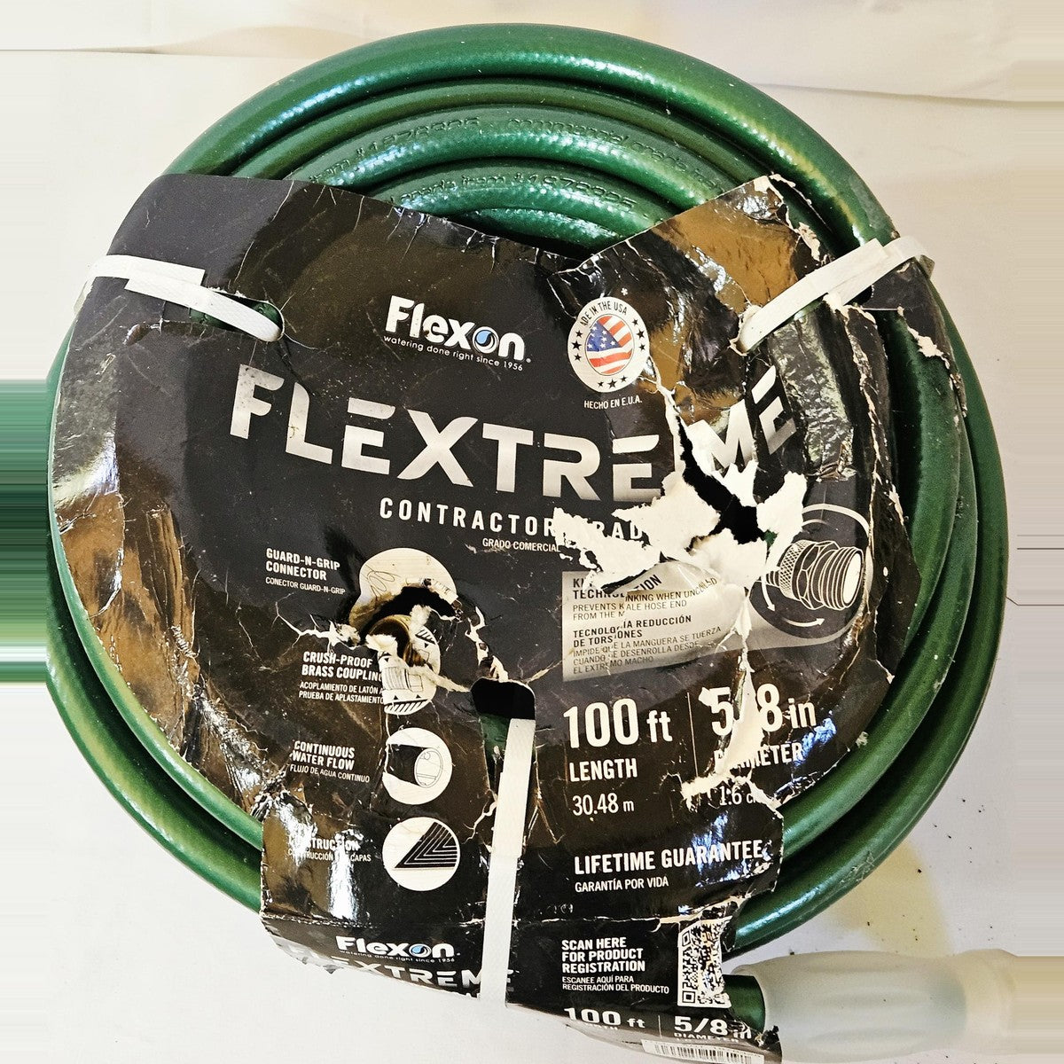 Flexon Flextreme 100 ft garden hose, top view with label
