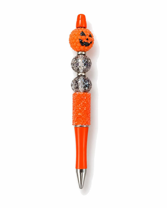 Jack-o-lantern Halloween beaded pen with orange barrel