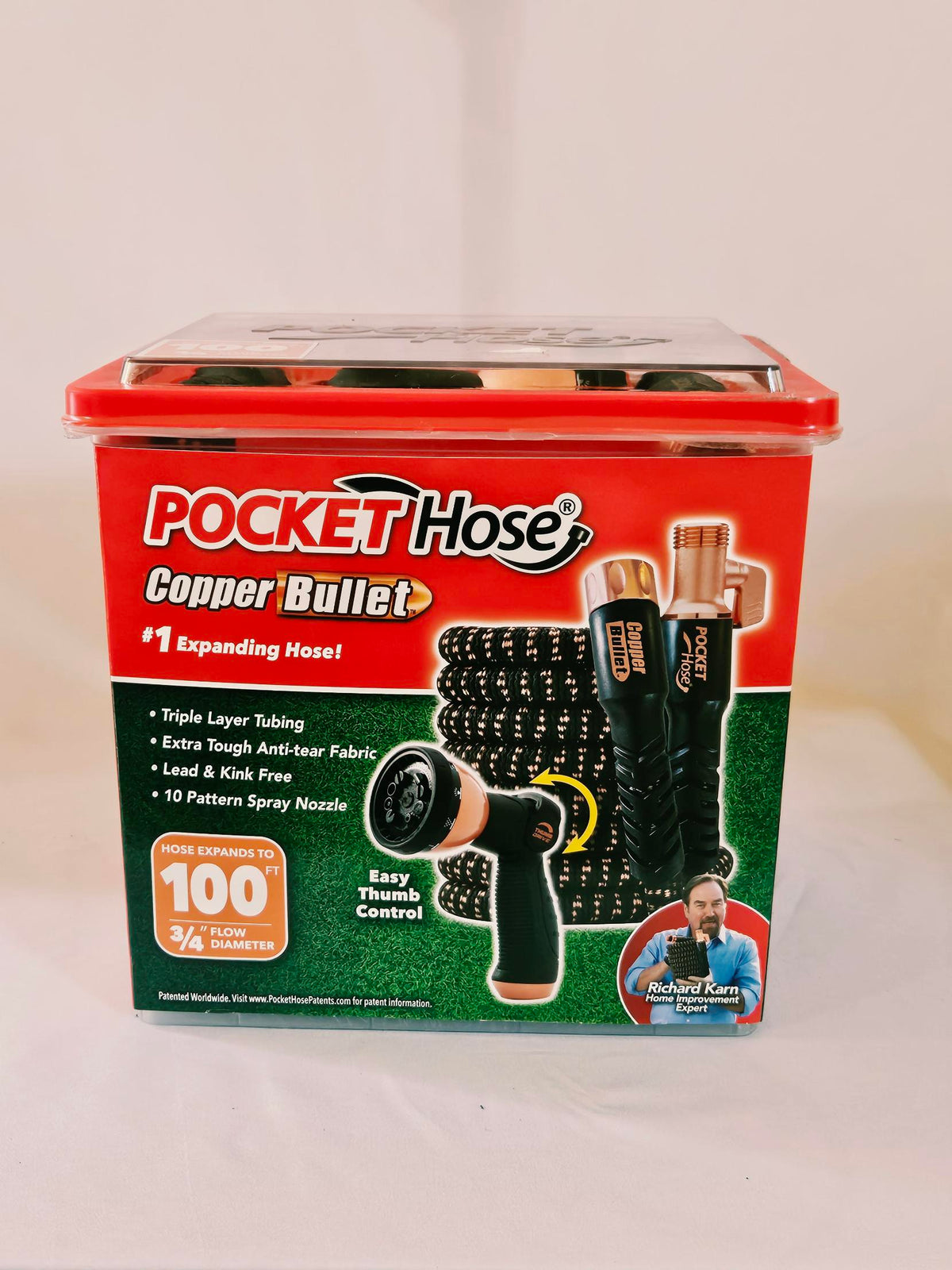 Pocket Hose Copper Bullet 100 ft storage tub front