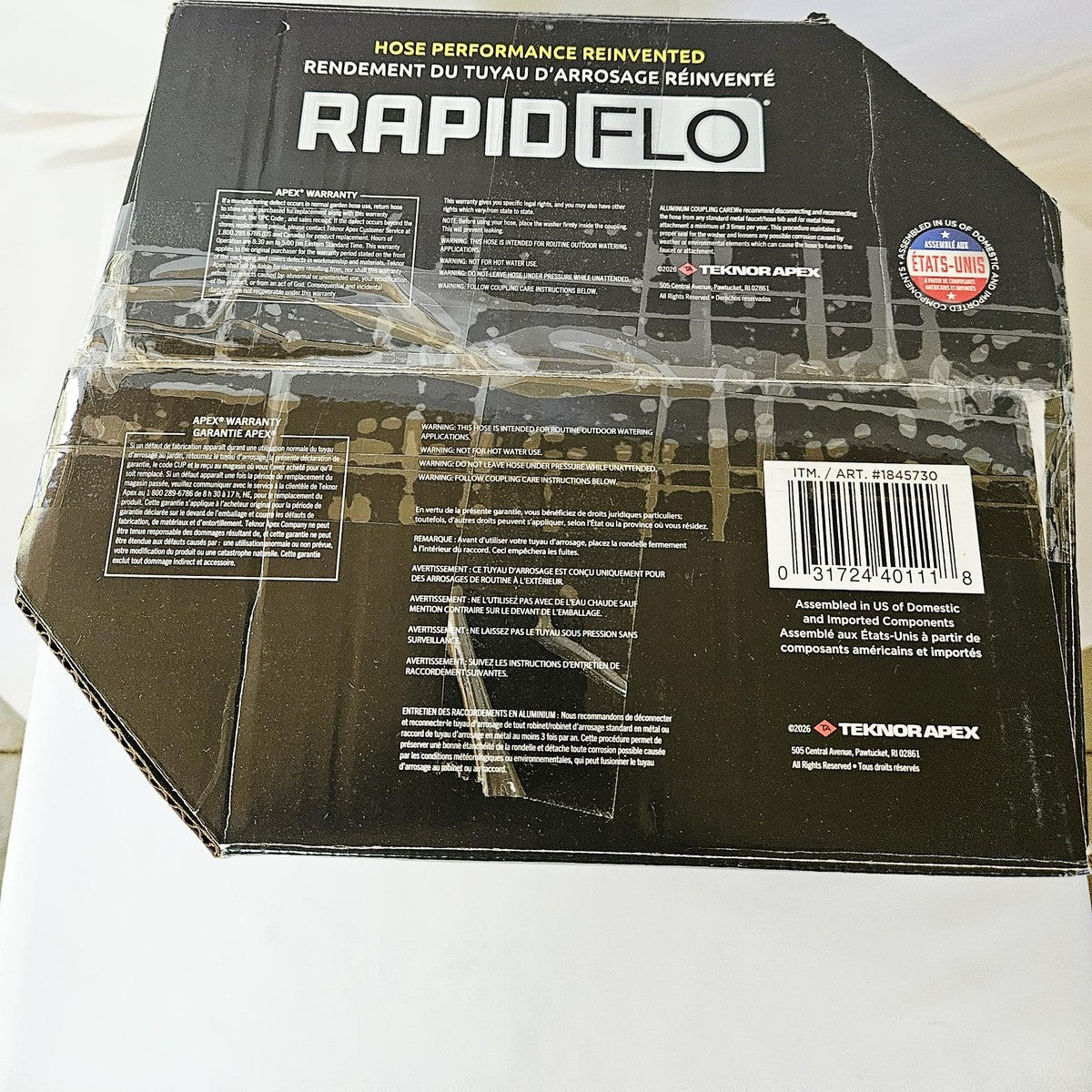 RapidFlo garden hose box, top with warranty information